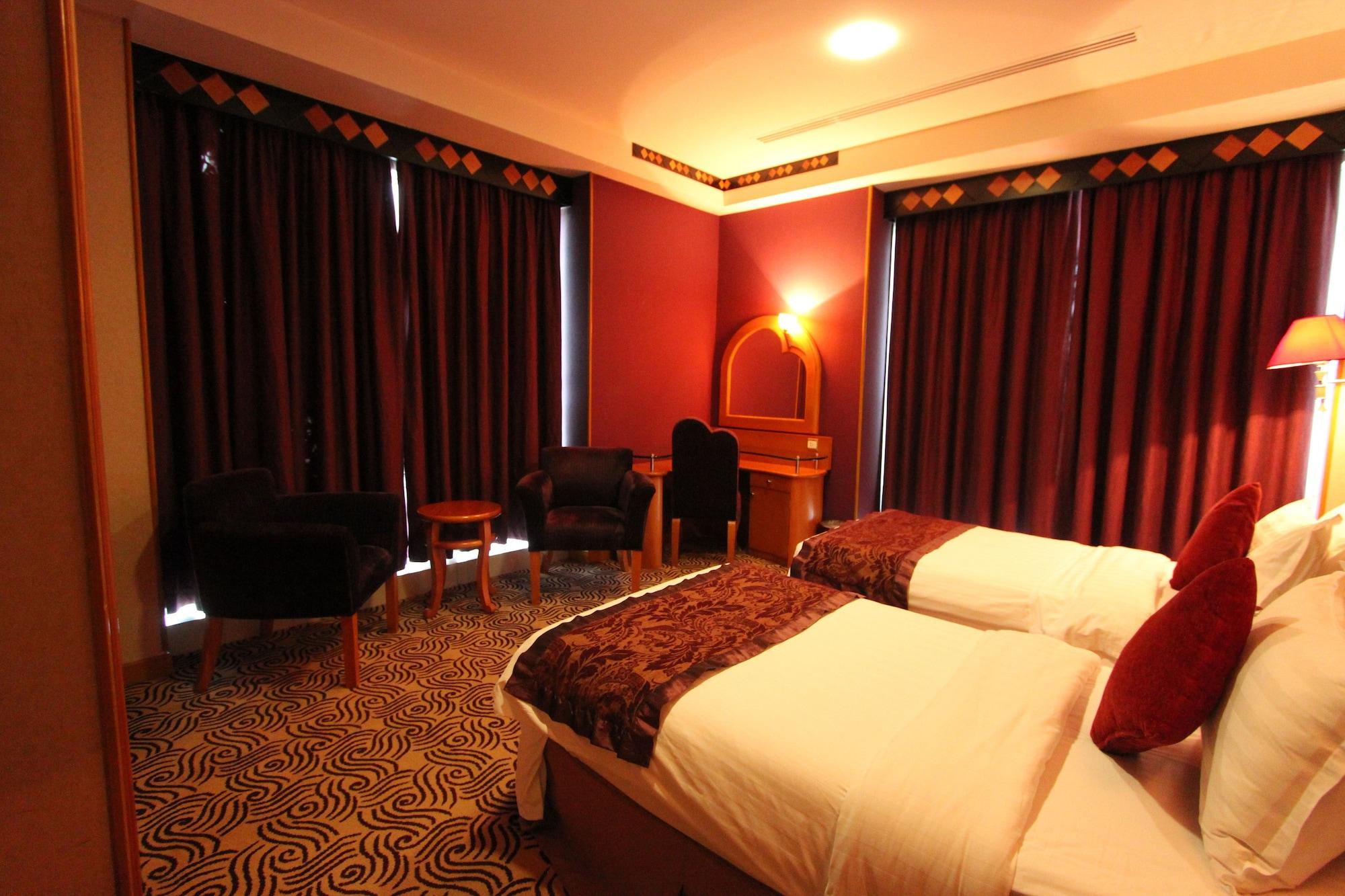 Awaliv International Hotel Ta'if Exteriör bild A room at the hotel