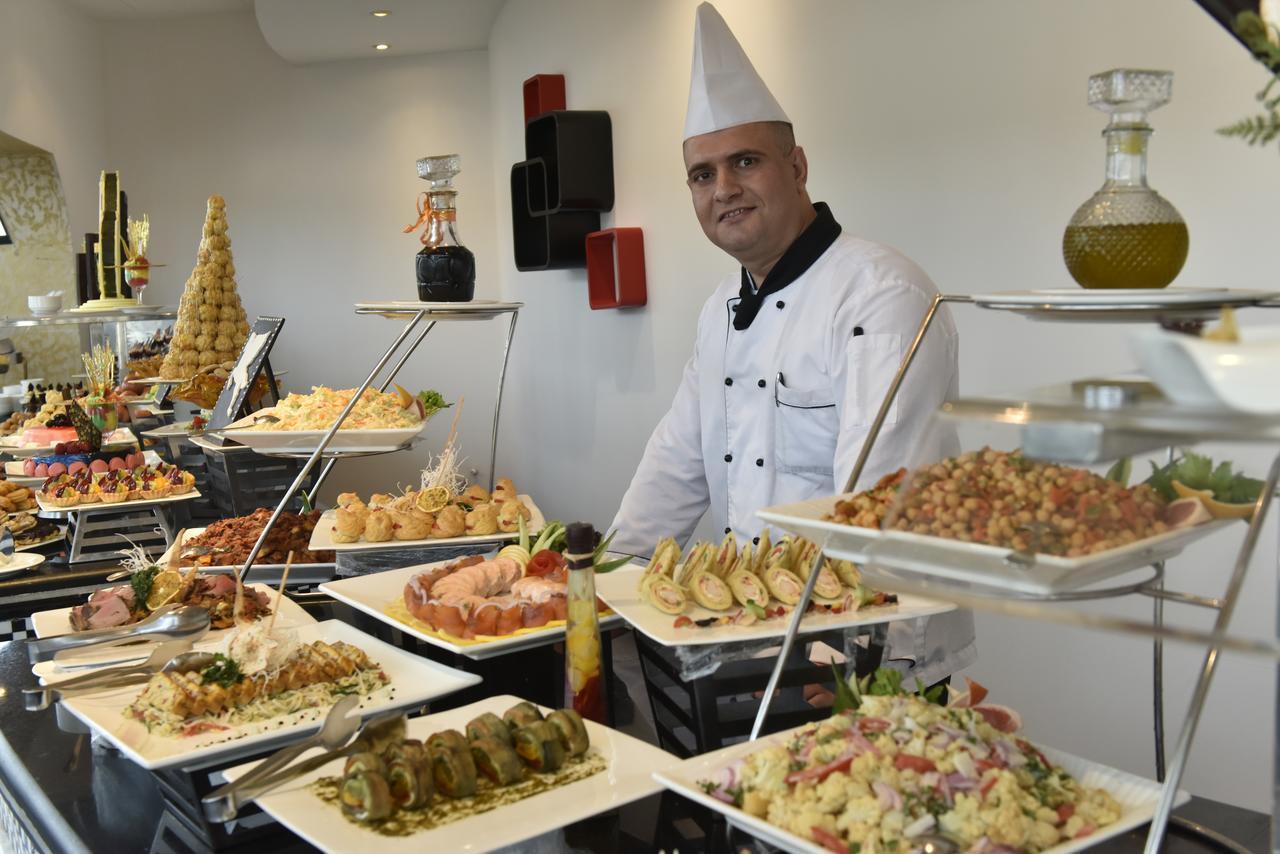 Awaliv International Hotel Ta'if Exteriör bild A buffet at a hotel